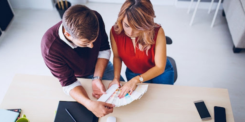 Interior designers working together in their workplace