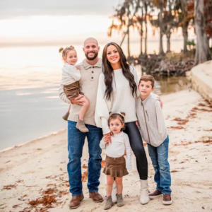Gage Wilkinson, wife Brye, and family