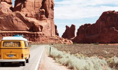 yellow Volkswagen van on road