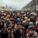 Crowded border scene with diverse individuals and landscapes.