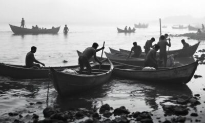 Vietnamese smugglers preparing boats for Channel crossing.