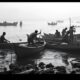 Vietnamese smugglers preparing boats for Channel crossing.