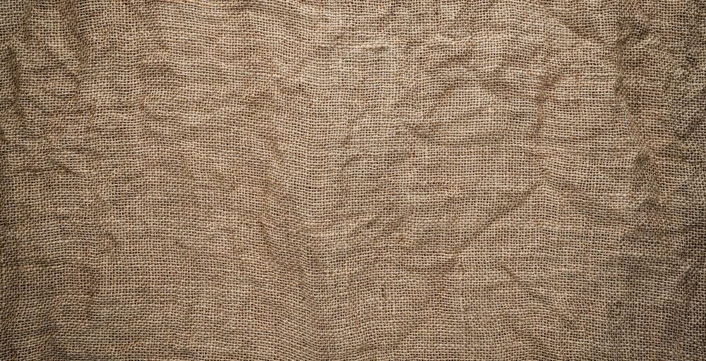 brown textile on brown wooden table