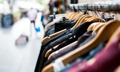 selective focus photography of hanged clothes