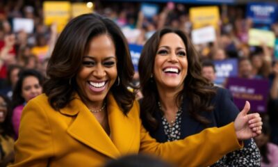 Michelle Obama and Kamala Harris smiling at rally.