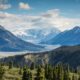 green mountain across body of water