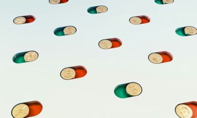 a group of pills floating in the air