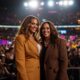 Beyoncé and Kamala Harris at Houston rally with crowd.