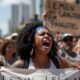 Protesters expressing outrage in El Paso over migrant release.