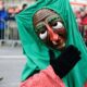 woman in green hijab and red long sleeve dress