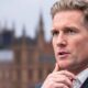 Keir Starmer in a suit, focused on Brexit negotiations.