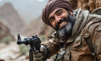 Smuggler with gun, smiling in outdoor setting.