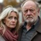 Distressed couple outside their home in Droylsden.