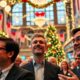 Holiday decorations and people in business attire at market.