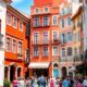 Colorful buildings and lively streets in Lisbon, Portugal.