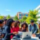 HBCU students collaborating in a tech innovation setting.