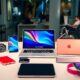 Colorful tech gadgets on a stylish modern desk.