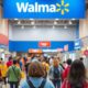 Busy Walmart store with shoppers and modern technology.