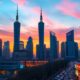 Shanghai skyline with illuminated skyscrapers at sunset.