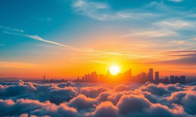 Sunrise over a city skyline symbolizing economic growth.