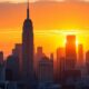 New York City skyline at sunset, conveying economic optimism.