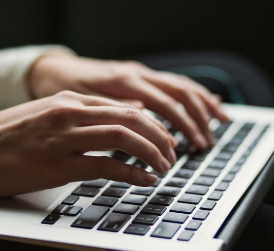 person using laptop
