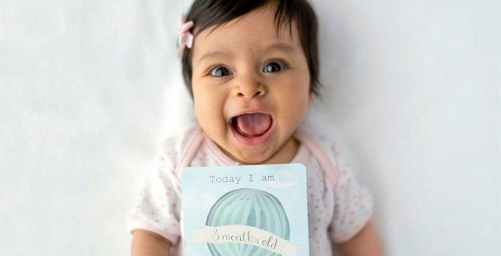 baby with 8 months old card