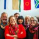 Afrikaner group smiling in a welcoming environment.
