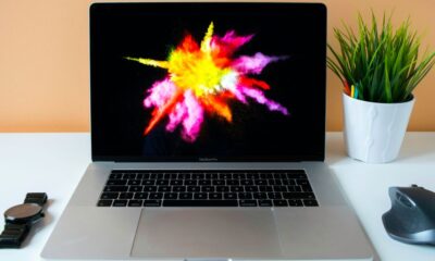 MacBook Pro showing purple illustration