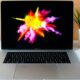 MacBook Pro showing purple illustration
