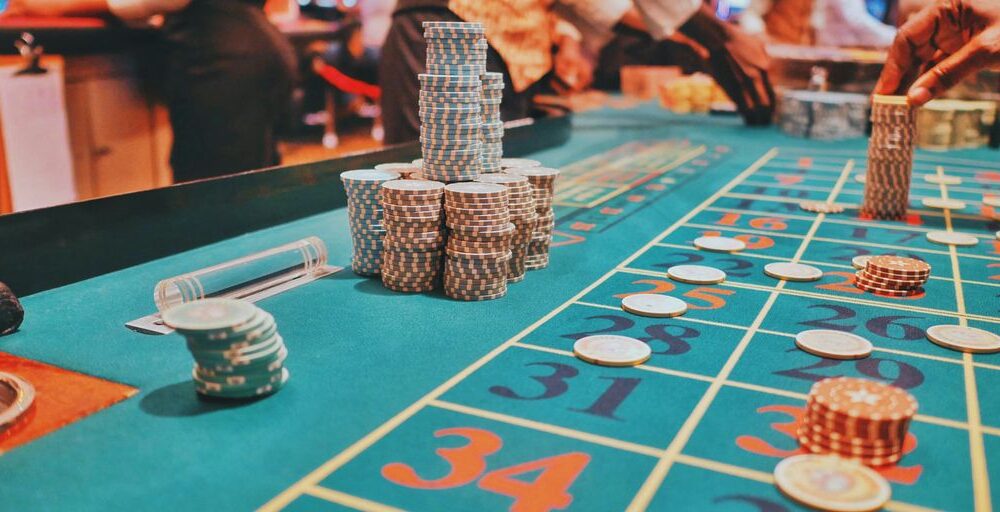 a casino table with a lot of chips on it