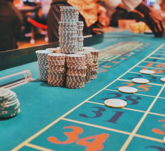 a casino table with a lot of chips on it