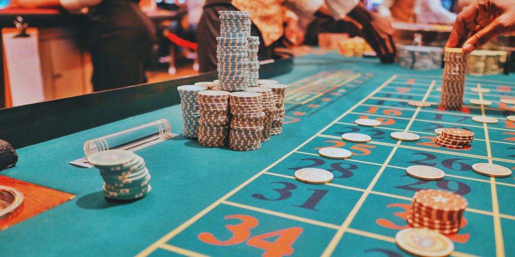 a casino table with a lot of chips on it