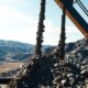 Miner extracting minerals in Ukraine amidst conflict.