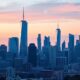 City skyline with tech graphics reflecting market growth.