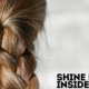 Assorted hair skin and nail vitamins in a hand