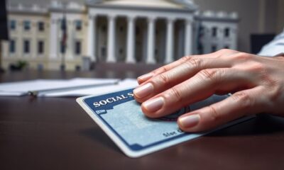 Close-up of a Social Security card and concerned person.