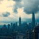 Financial district skyline under stormy clouds.
