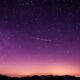 silhouette photo of mountain during night time