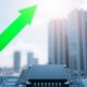 Green arrow soaring over Nvidia chip.