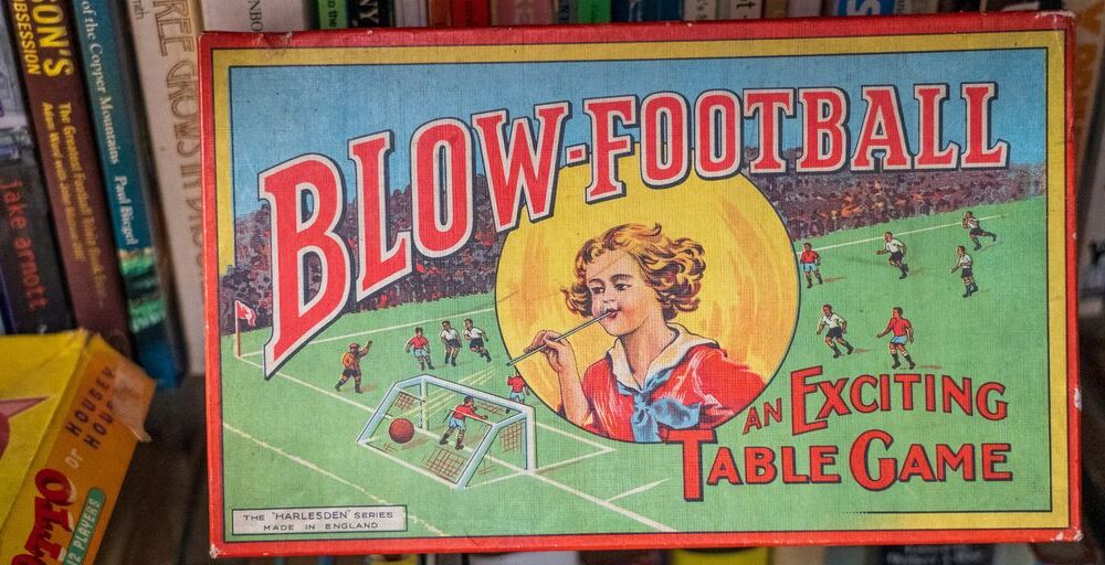 the big one book on brown wooden shelf