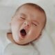 a baby with its mouth open