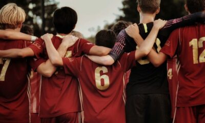 boys in red jersey shirts