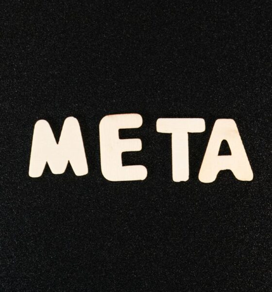 a close up of a black surface with white letters