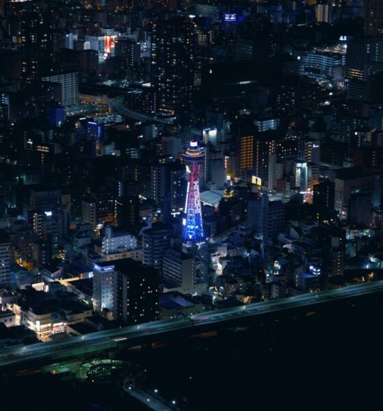 Aerial view of a city skyline at night.