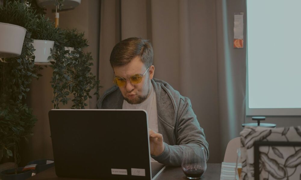 man working on laptop