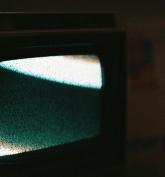 black crt tv turned on showing blue screen